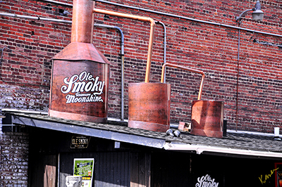 Photo of the Ole Smoky Moonshine still on the roof of a building in downtown Knoxville, Tennessee