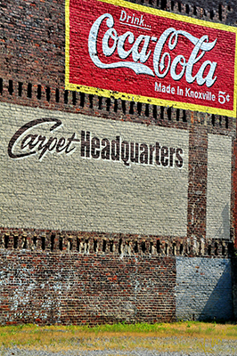 Drink Coca-Cola Made in Knoxville 5 cents sign painted on Carpet Headqurters, Photo of painted brick buildings
